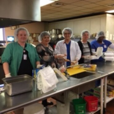 Nursing home pitches in to help keep people in need warm and fed